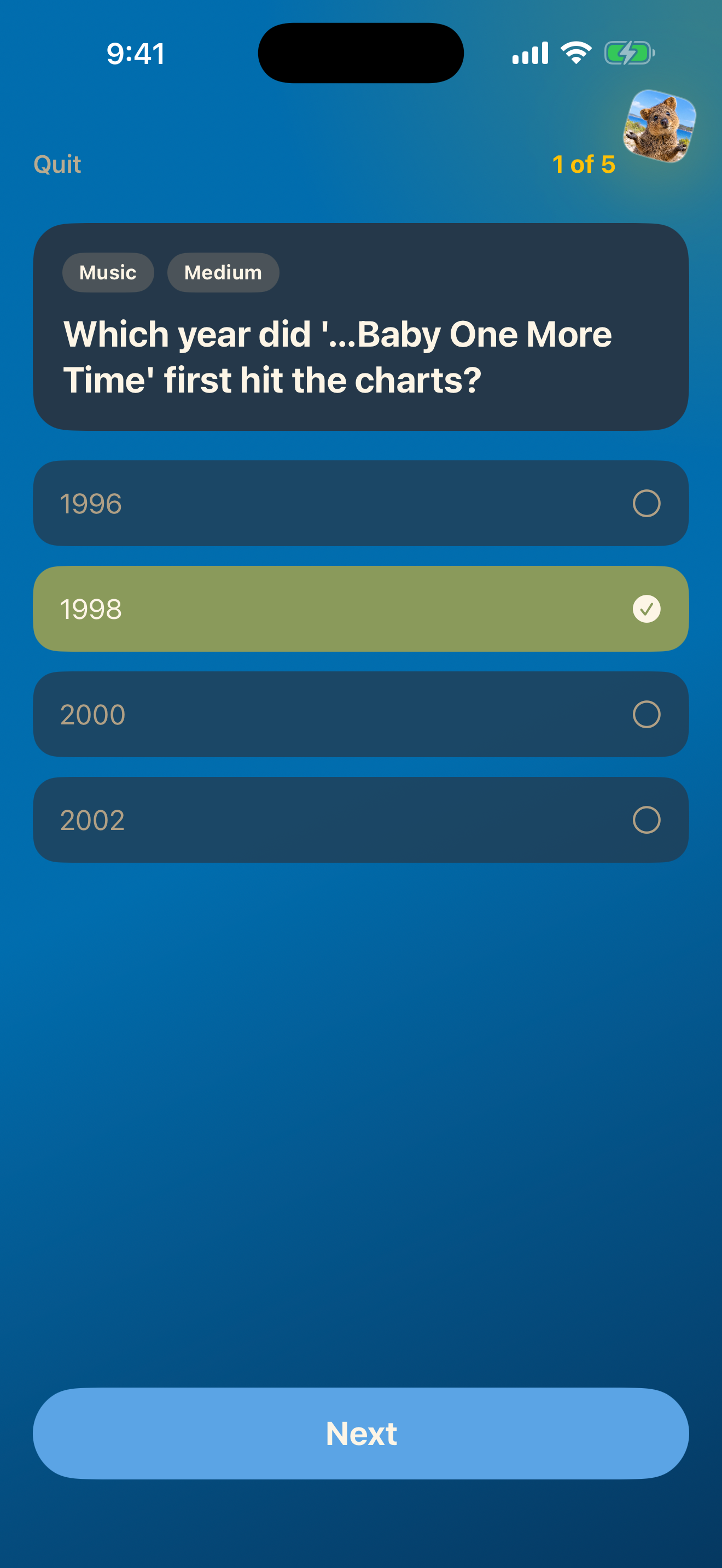 Correct 1998 answer highlighted after a music trivia question